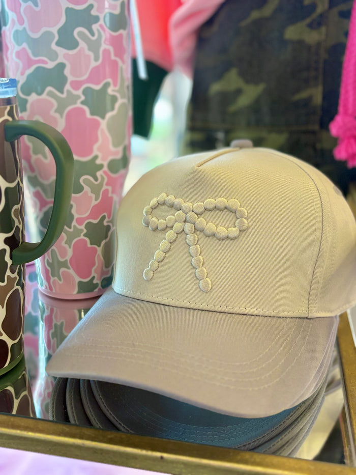 monochromatic bow trucker hat