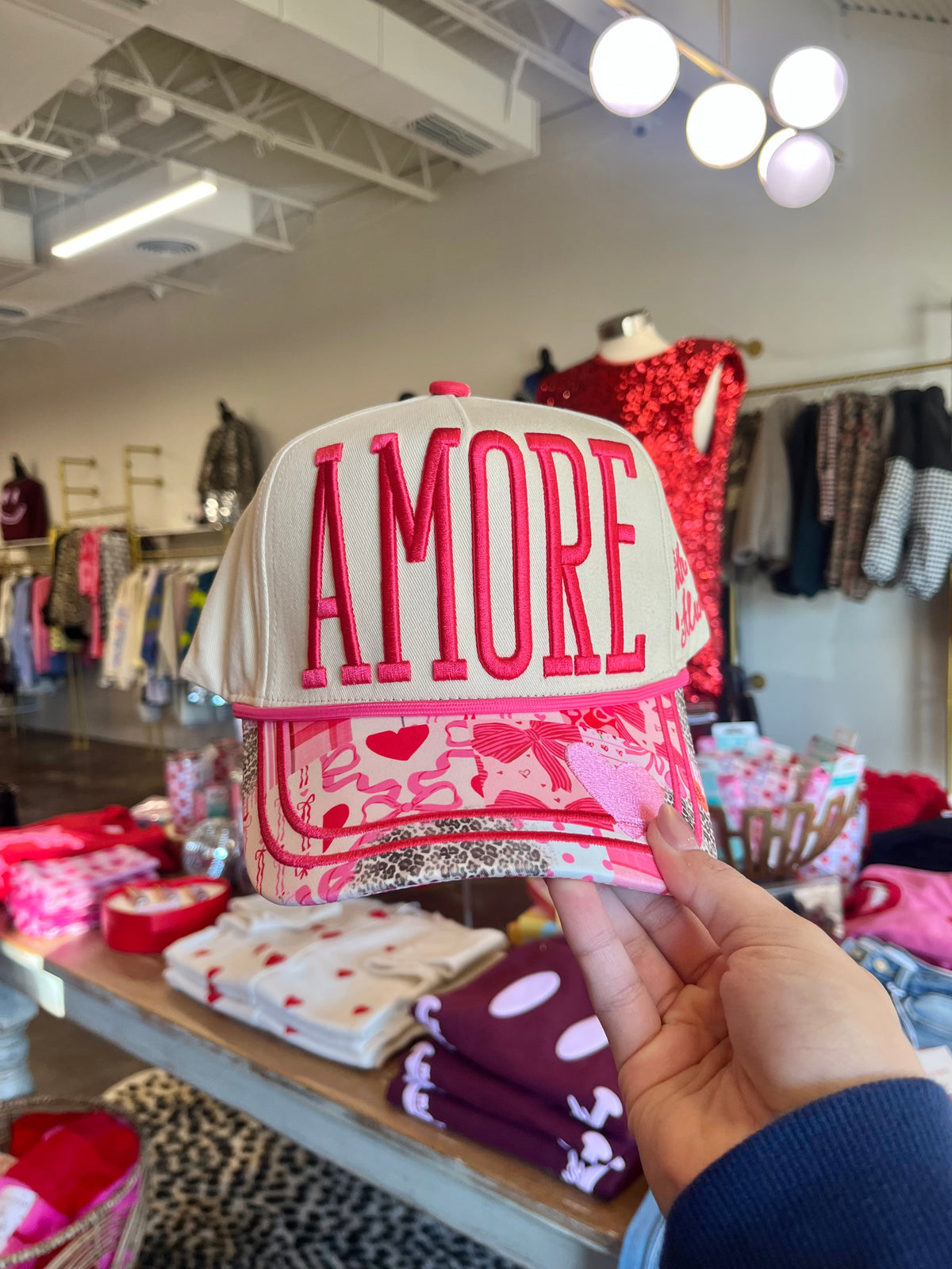amore trucker hat