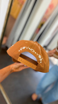 football laces puff trucker hat