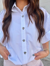 a step above white blouse