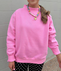 bubblegum mockneck sweatshirt
