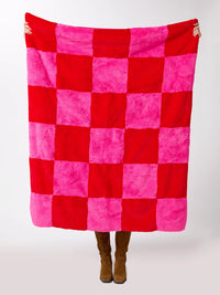 pink + red check faux fur blanket