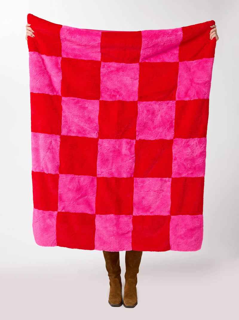 pink + red check faux fur blanket