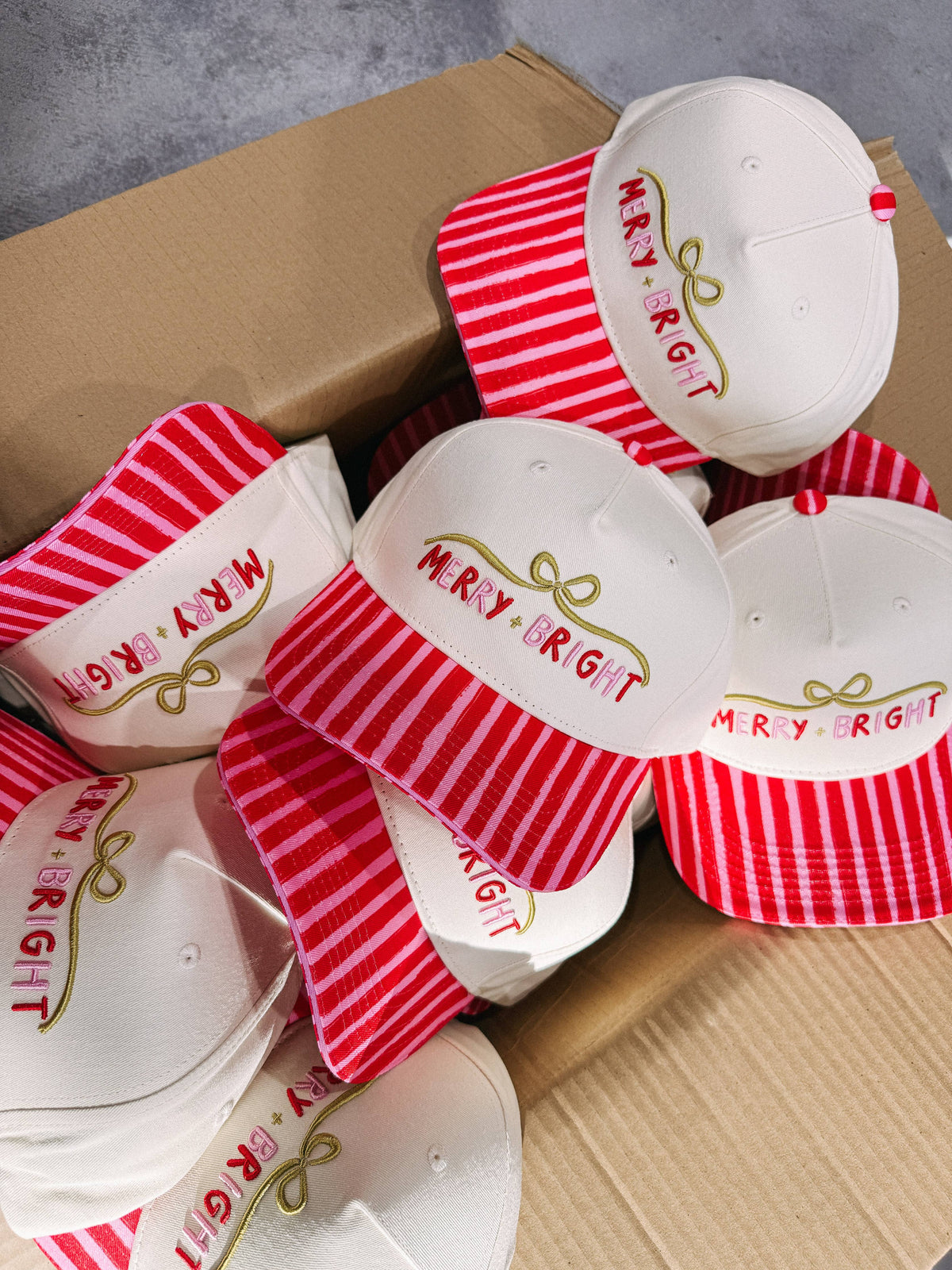 merry + bright trucker hat - cream / red / pink