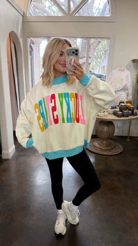 lucky stars reversible mock neck sweatshirt