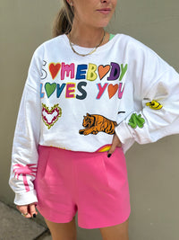 somebody loves you graphic crewneck