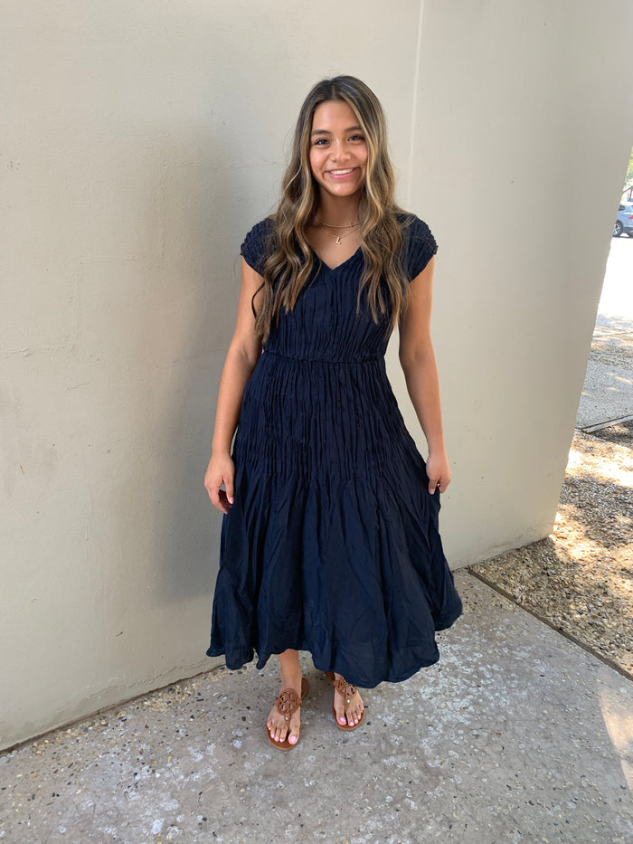 longing for more navy pleated midi