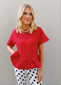 logan mixed media peplum top