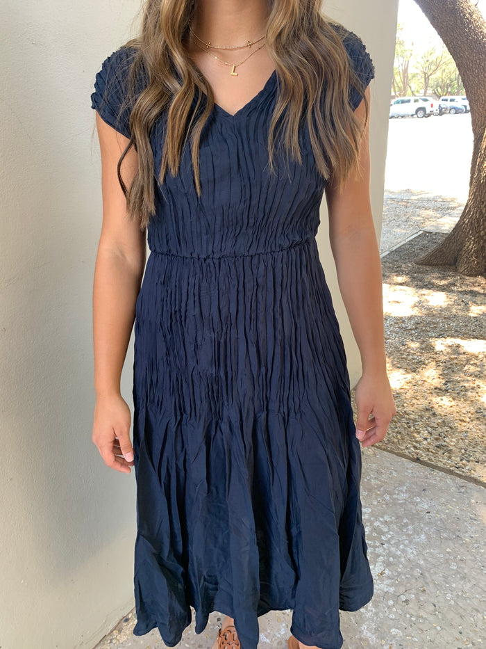 longing for more navy pleated midi