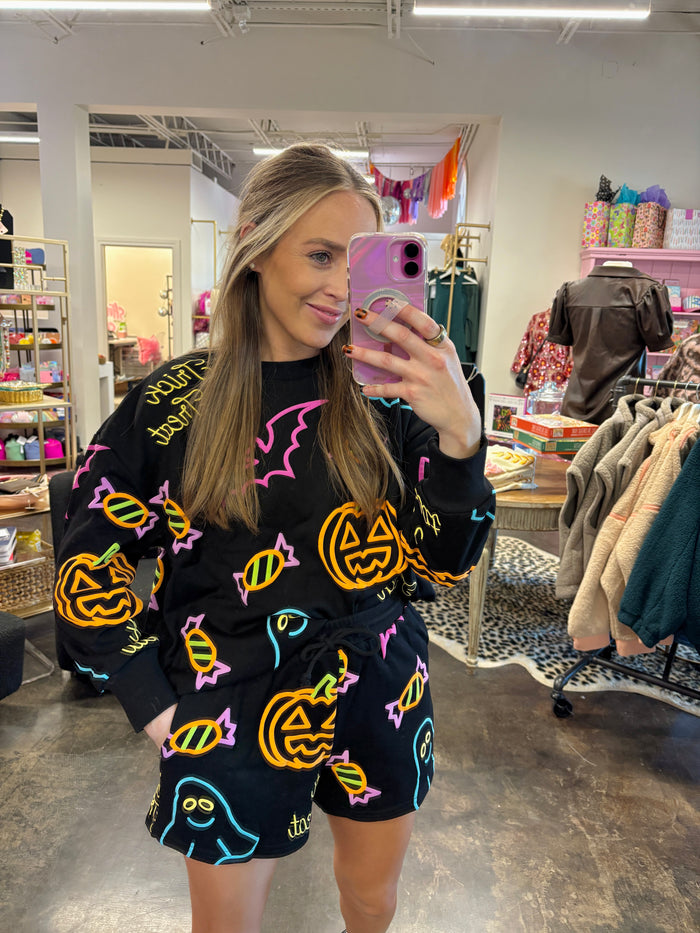 neon nights trick or treat sweatshirt