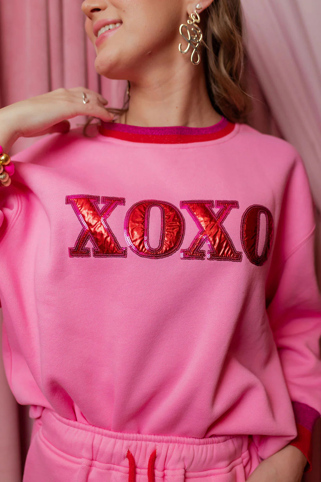 pink xoxo fleece-lined sweatshirt