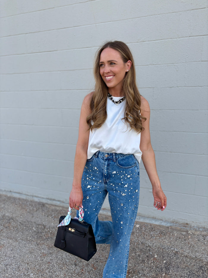 white silky bubble hem top