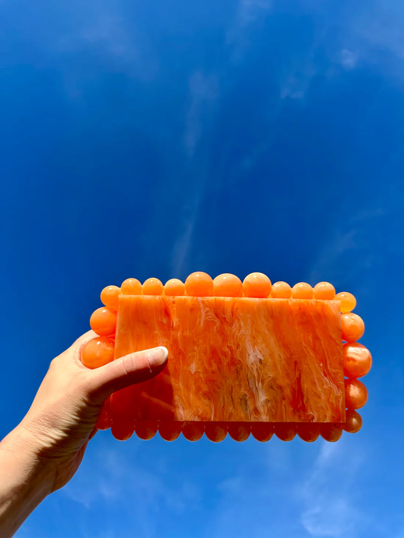 daphne acrylic clutch