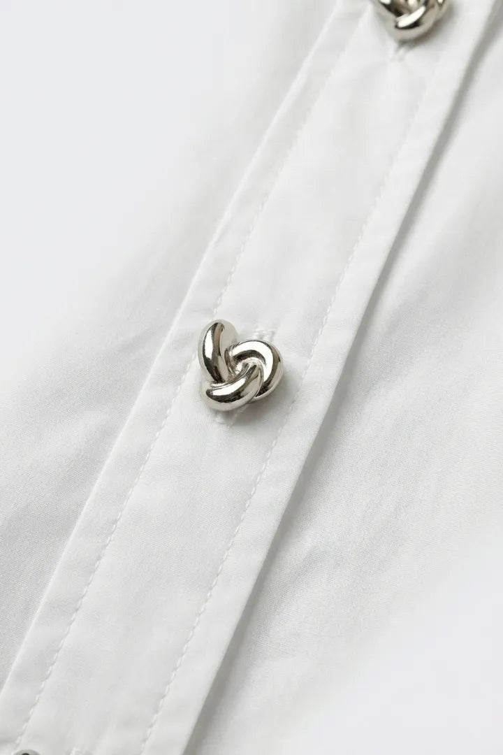 a step above white blouse