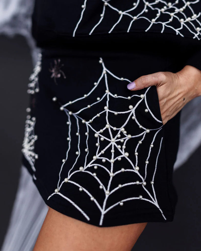 pearl webs spider skort