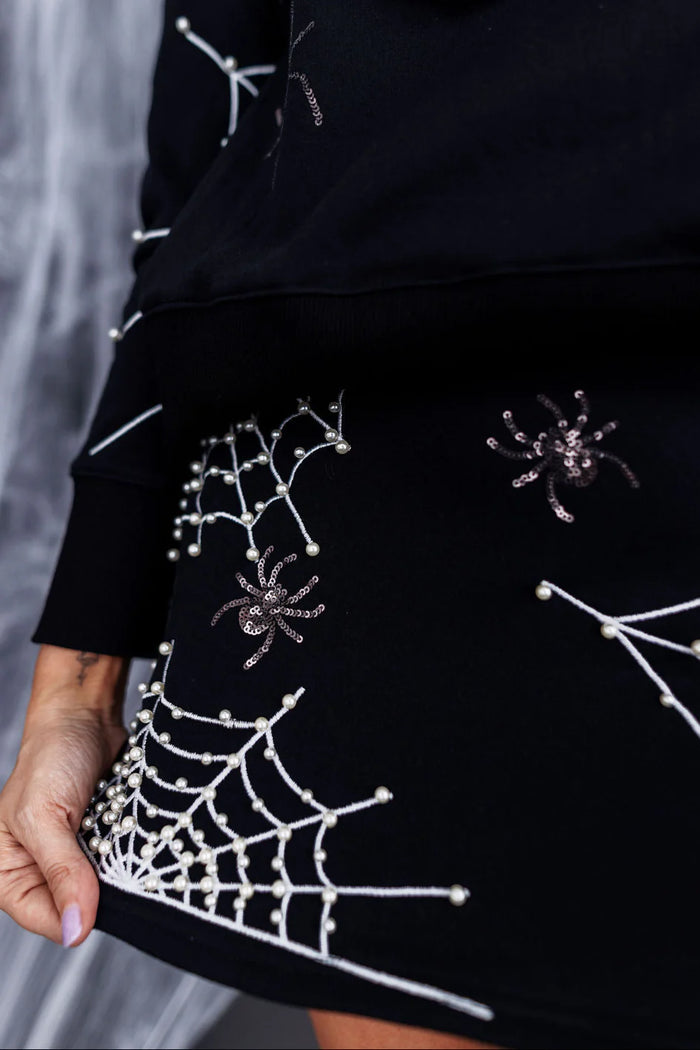 pearl webs spider skort