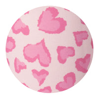 Round pink pattern close up with heart pattern on a white background