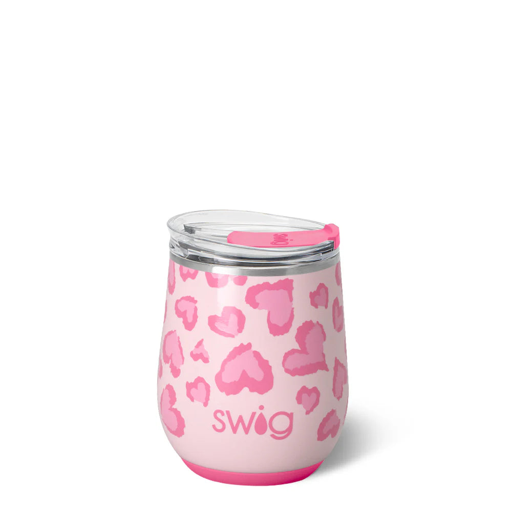 Pink leopard print swig tumbler on a white background