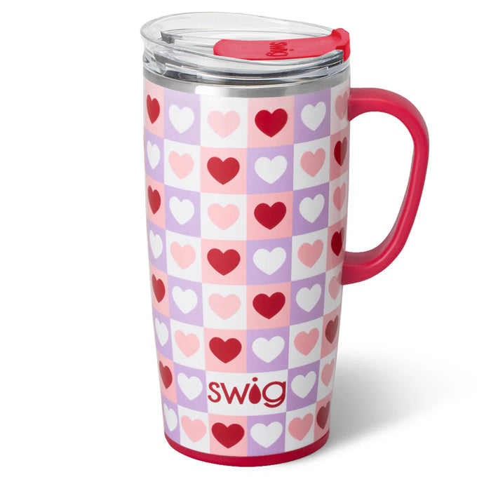 Swig travel mug with heart pattern on a white background