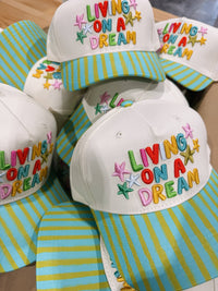livin' on a dream trucker hat - blue / green
