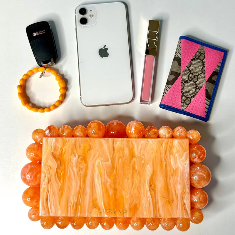 daphne acrylic clutch